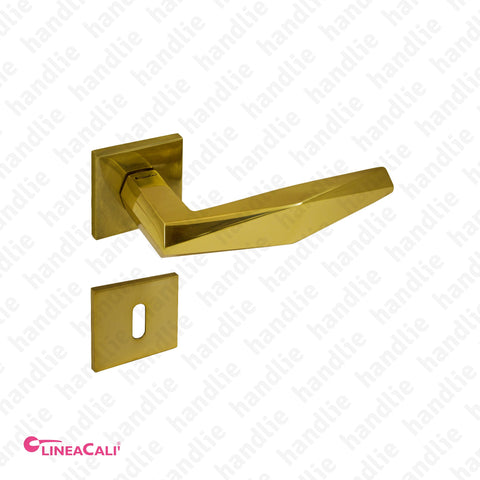 P.1280 - PRISMA - Lever handle pair for doors - Brass