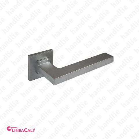 P.1300 - SINTESI - Lever handle pair for doors - Brass
