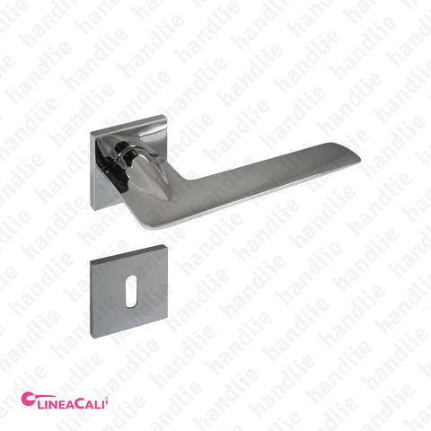P.1425 - JET - Lever handle pair for doors - Brass